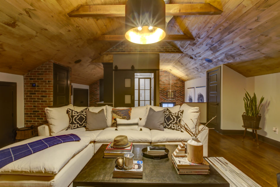 attic remodel with wood ceiling