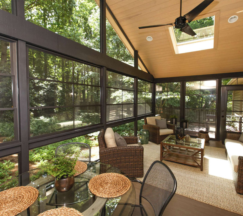 sun room with wood cieling and seating