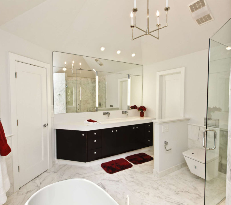 white bathroom with red accents